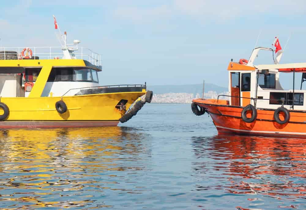 wo fishing boats. Boat - Ship collision risk concept photo