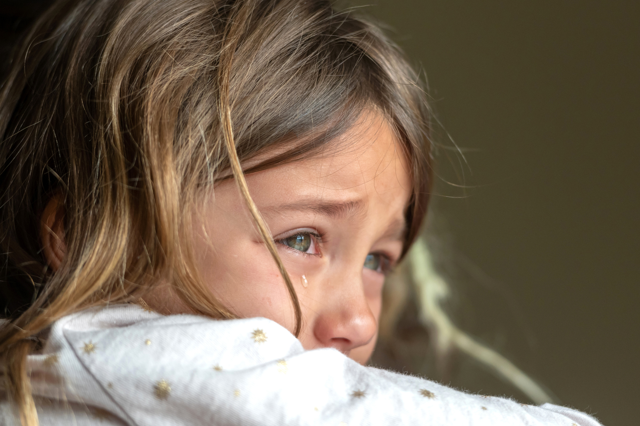 Child Injury Lawyer Florida - Young girl crying after an injury and needing family support