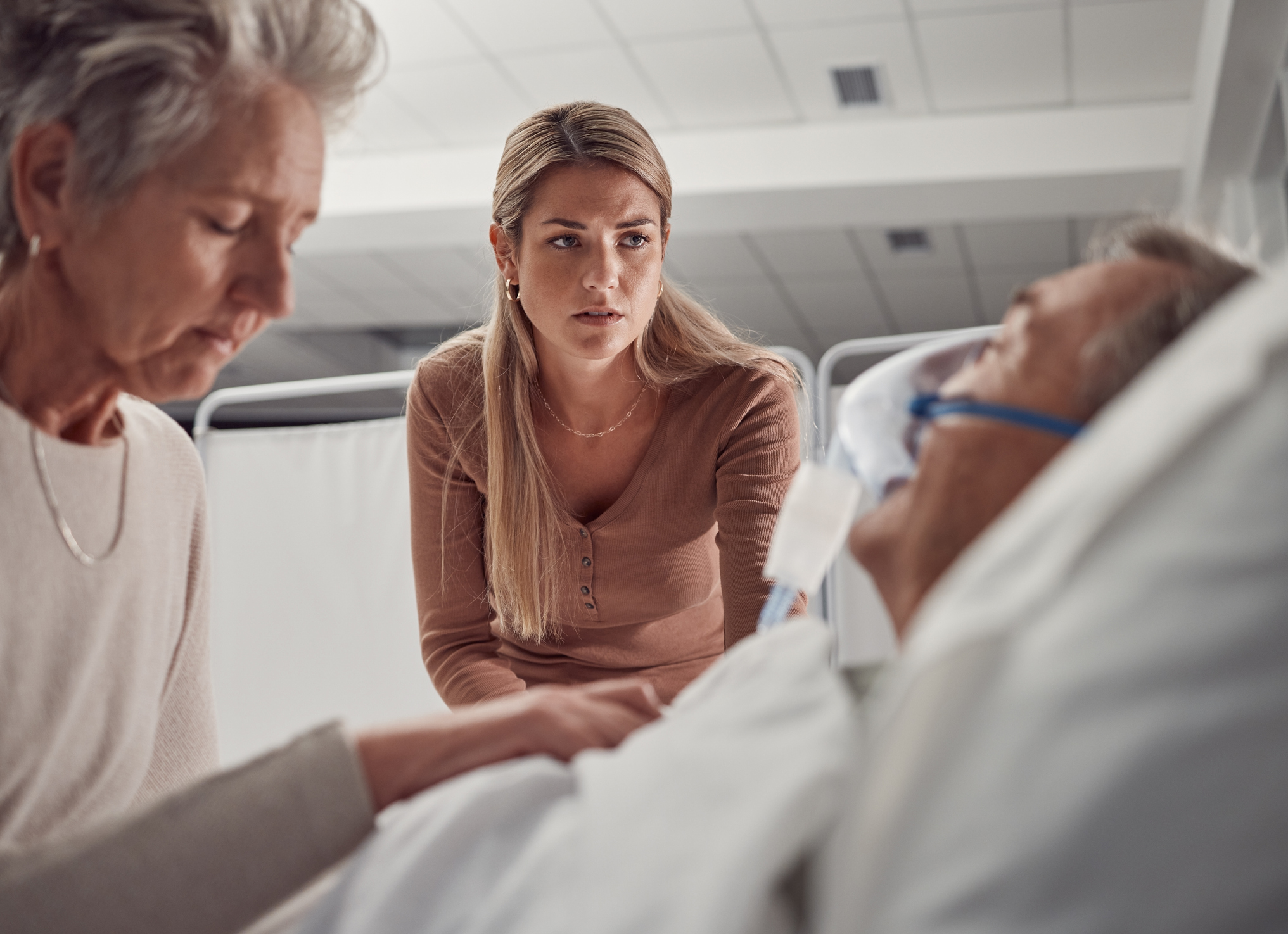 Family supporting a hospitalized patient after unexpected medical harm