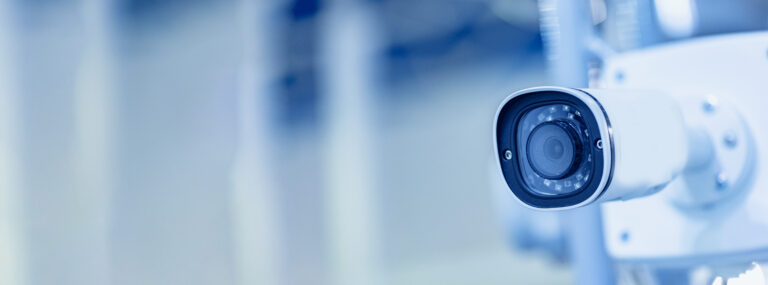 A security camera mounted indoors.