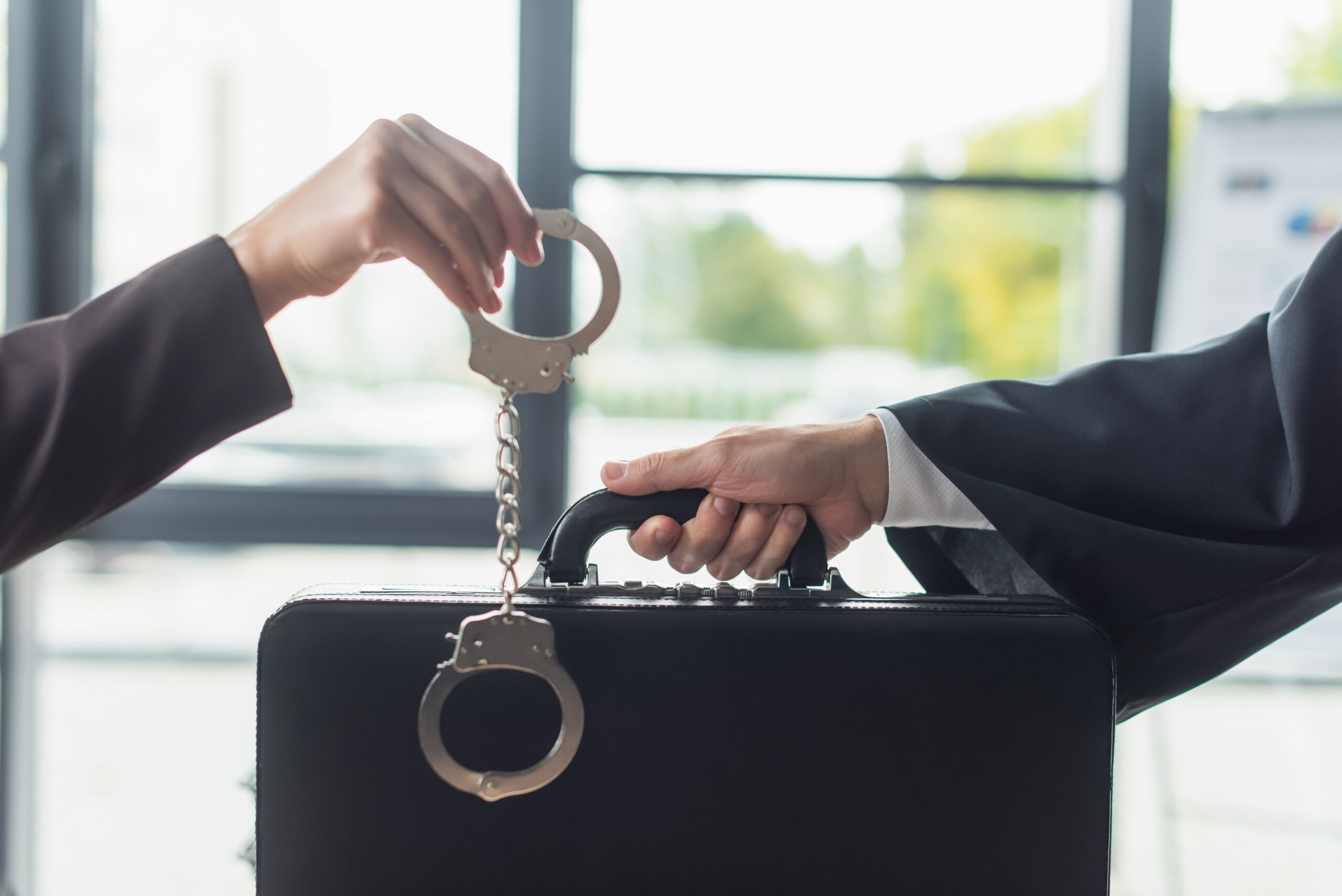 Handcuffs illustrating white-collar criminal defense in Pompano Beach